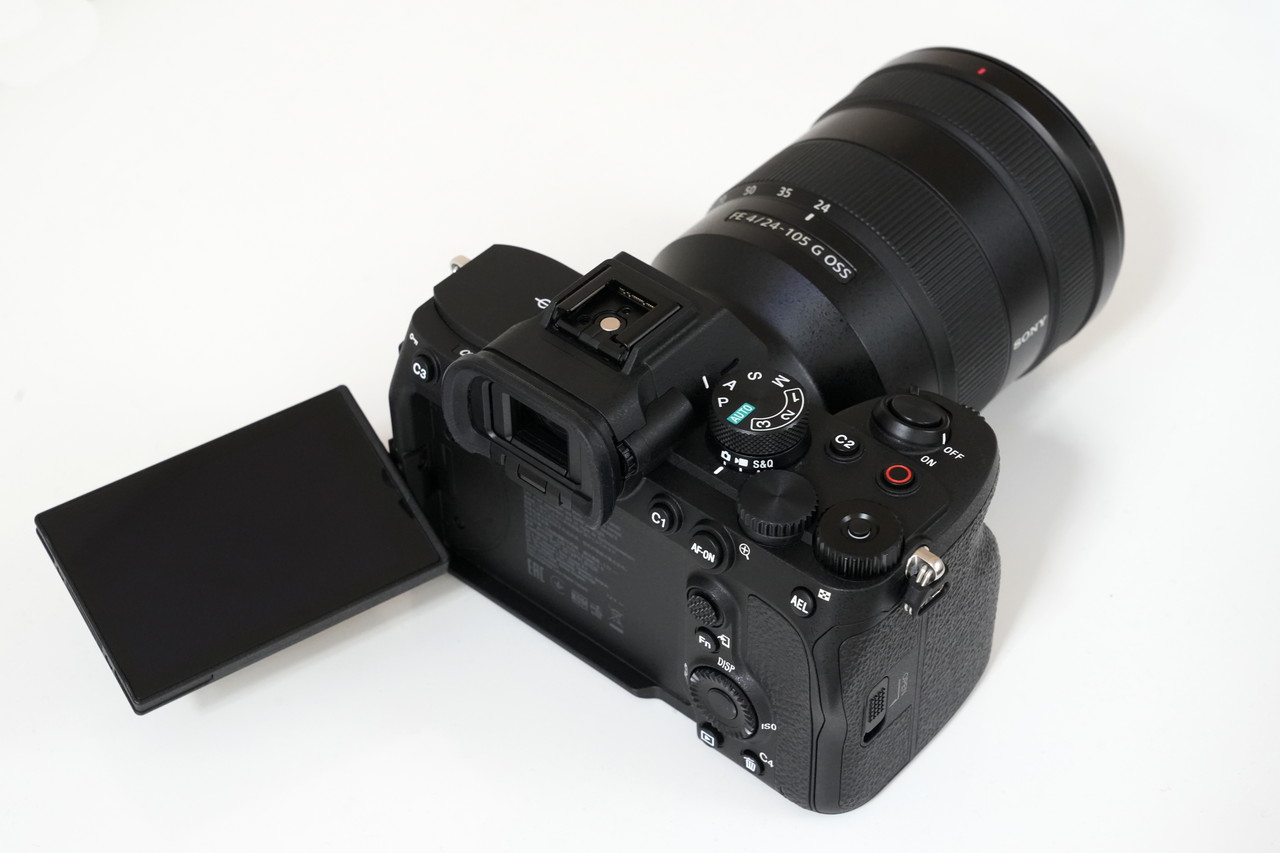 Sony α7 IV rear body controls and open monitor, cropped stock photograph